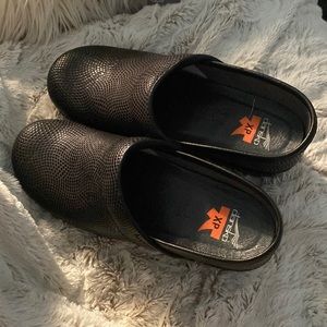 Dansko. Black. Like new! Skip resistant. 38
